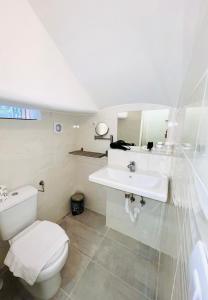 Koupelna v ubytování Hotel Pisa