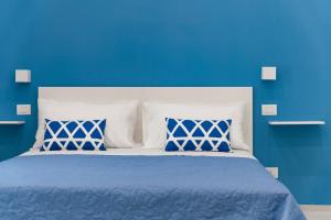 Postel nebo postele na pokoji v ubytování Blue Coral Suite