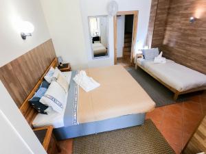 Postel nebo postele na pokoji v ubytování Dream Lagos B&B