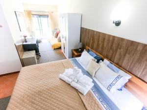 Postel nebo postele na pokoji v ubytování Dream Lagos B&B