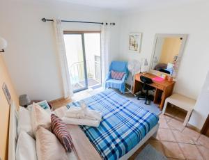 Postel nebo postele na pokoji v ubytování Dream Lagos B&B