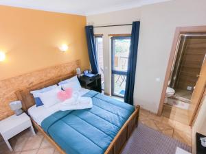 Postel nebo postele na pokoji v ubytování Dream Lagos B&B
