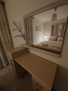 Postel nebo postele na pokoji v ubytování Nefeli Seaside Apartments