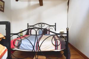Säng eller sängar i ett rum på Le Hibou @ Le Prielle
