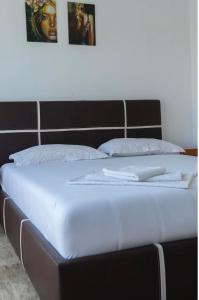 Postel nebo postele na pokoji v ubytování Franovic Apartments
