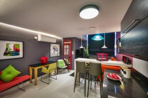 Area soggiorno di 21st Floor Hotel