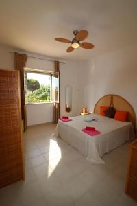 Postel nebo postele na pokoji v ubytování Villa Bouganville - charming sea ​​view- 160 mq