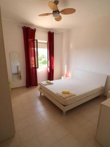 Postel nebo postele na pokoji v ubytování Villa Bouganville - charming sea ​​view- 160 mq