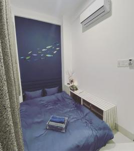 Tempat tidur dalam kamar di LILY HOUSE( Mini home 2PN)