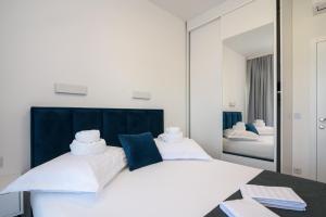 Posteľ alebo postele v izbe v ubytovaní Palm Springs