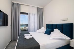 Posteľ alebo postele v izbe v ubytovaní Palm Springs