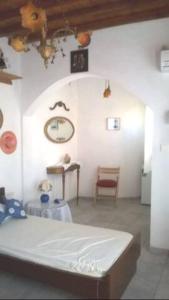 Lova arba lovos apgyvendinimo įstaigoje Apartment in the center of Artemonas, Sifnos