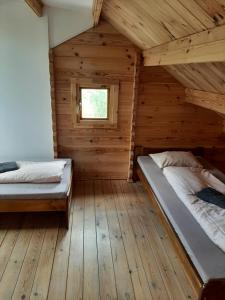 Tempat tidur dalam kamar di Domek Brno - Nový lískovec