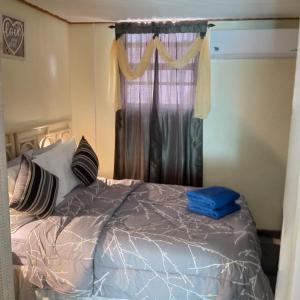 Un pat sau paturi într-o cameră la Westskye