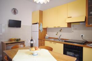 Kuchyňa alebo kuchynka v ubytovaní Amari Residence