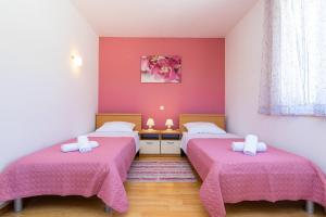 Postel nebo postele na pokoji v ubytování Apartment Grafulin