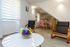 Posezení v ubytování Apartment Grafulin