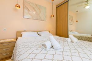 Postel nebo postele na pokoji v ubytování Apartment Grafulin