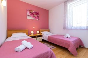 Postel nebo postele na pokoji v ubytování Apartment Grafulin