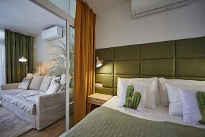Posteľ alebo postele v izbe v ubytovaní Cactus Sombrerudo- bright apartment next to Yumbo