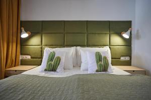 Posteľ alebo postele v izbe v ubytovaní Cactus Sombrerudo- bright apartment next to Yumbo