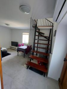 Postel nebo postele na pokoji v ubytování Apartman Sunset