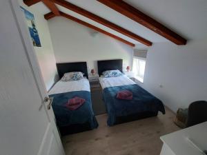 Postel nebo postele na pokoji v ubytování Apartman Sunset