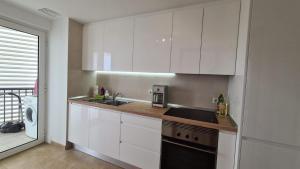 Kuchnia lub aneks kuchenny w obiekcie Dimi Holidays Porto Cristo SLU Meerblick 4 Apartment 4 - 120 m zum Strand