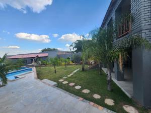 a courtyard of a building with a swimming pool at Bela Rest Resort in Bela-Bela