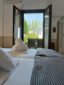 Posteľ alebo postele v izbe v ubytovaní Marios Garden House