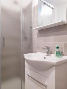Kúpeľňa v ubytovaní Levico Al Corso Apartments