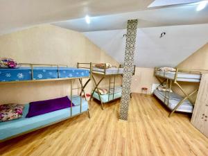 Postel nebo postele na pokoji v ubytování Hostel 13