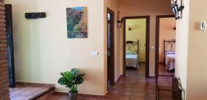Posteľ alebo postele v izbe v ubytovaní Alojamiento Rural Casitas Cueva del Gato