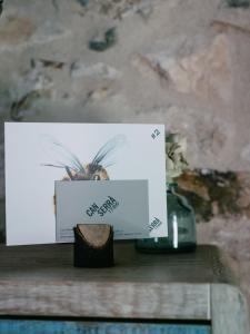 a box sitting on top of a wooden table at Can Serrà 1786 in Llagostera