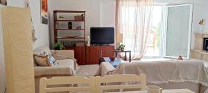 Μια τηλεόραση ή/και κέντρο ψυχαγωγίας στο Villa Βianca in Sithonia