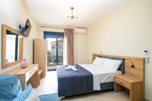 A bed or beds in a room at Villa MARIA