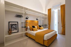 a bedroom with a large bed in a room at relais metis in Naples