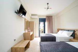 A bed or beds in a room at Villa MARIA