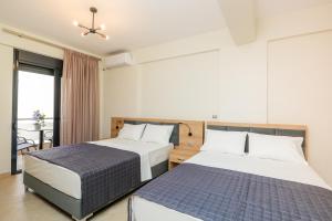 A bed or beds in a room at Villa MARIA