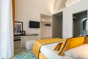 Телевизор и/или развлекательный центр в relais metis +41 фотография