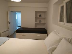 Posteľ alebo postele v izbe v ubytovaní Sweet & Cosy Αpartment in Chora's old town