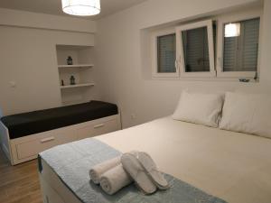 Posteľ alebo postele v izbe v ubytovaní Sweet & Cosy Αpartment in Chora's old town