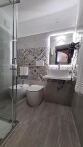 Kylpyhuone majoituspaikassa Artemide