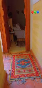 Postel nebo postele na pokoji v ubytování Riad Aquarelle By GE