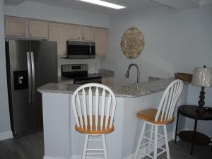 Köök või kööginurk majutusasutuses Brunswick Plantation Golf Condo 307M