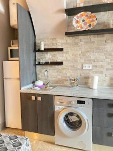 Kuchyň nebo kuchyňský kout v ubytování Estudio casa Lola