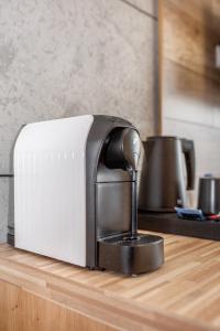 a toaster sitting on top of a kitchen counter at Kamienica Morska Gdynia in Gdynia +180 photos