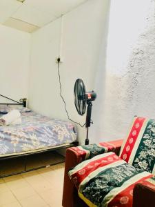 Postel nebo postele na pokoji v ubytování Greenleaf Guesthouse