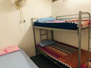Postel nebo postele na pokoji v ubytování Greenleaf Guesthouse