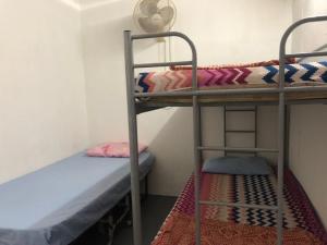 Postel nebo postele na pokoji v ubytování Greenleaf Guesthouse